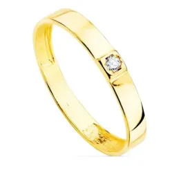 Sortija oro 18k centro una circonita cuerpo 3mm. liso