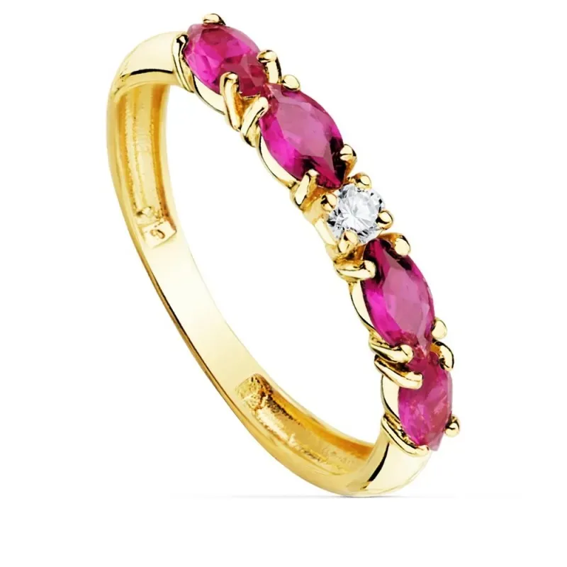 Sortija oro 18k circonitas fucsias talla marquise centro blanca cuerpo 2.5mm. liso