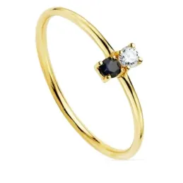 Sortija oro 18k centro diamante brillante 0.05ct. zafiro cuerpo liso