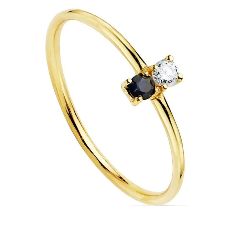 Sortija oro 18k centro diamante brillante 0.05ct. zafiro cuerpo liso