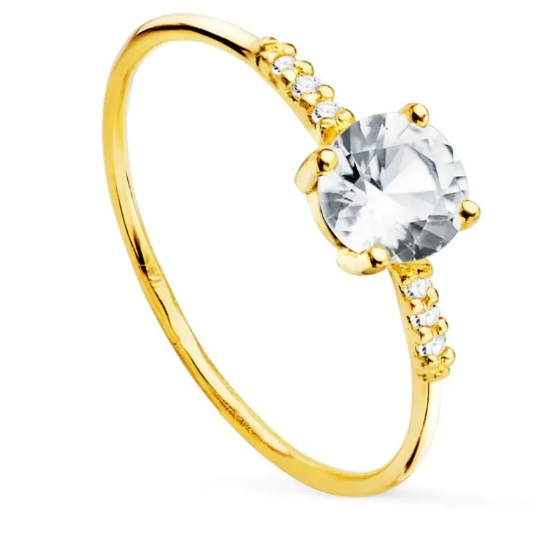 Sortija oro 18k mujer topacio centro garras combinado laterales 0.543