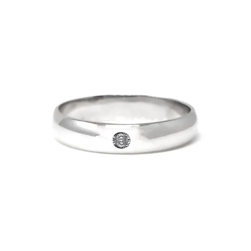Alianza oro blanco 18k lisa diamante brillante centro 0.032ct. media