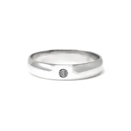 Alianza oro blanco 18k lisa diamante brillante centro 0.032ct. media