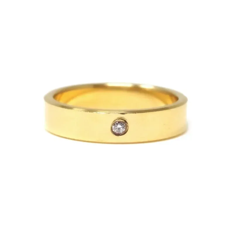 Alianza oro 18k diamante brillante centro 0.032ct. combinada lisa