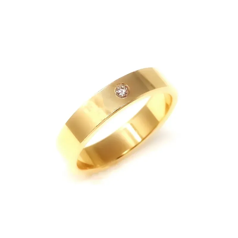 Alianza oro 18k diamante brillante centro 0.032ct. combinada lisa