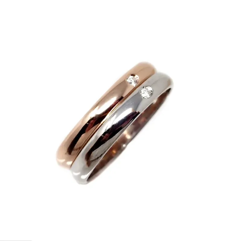 Alianza oro bicolor 18k brillantes centro 0.032ct. diámetro 2mm. Anch