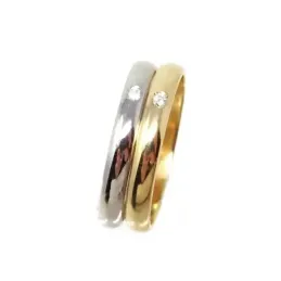 Alianza oro bicolor 18k dos brillantes 0.032ct. diámetro 2mm. Ancho 3