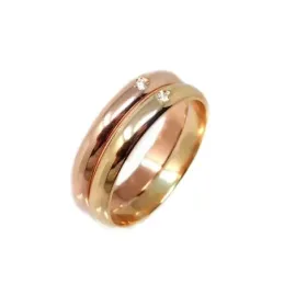 Alianza oro bicolor 18k dos brillantes 0.032ct. Diámetro 2mm. Ancho 3