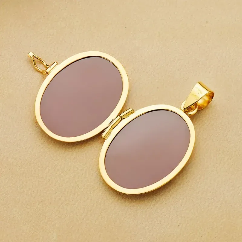 Colgante oro 18k portafotos oval labrado 27mm. [AA7461]