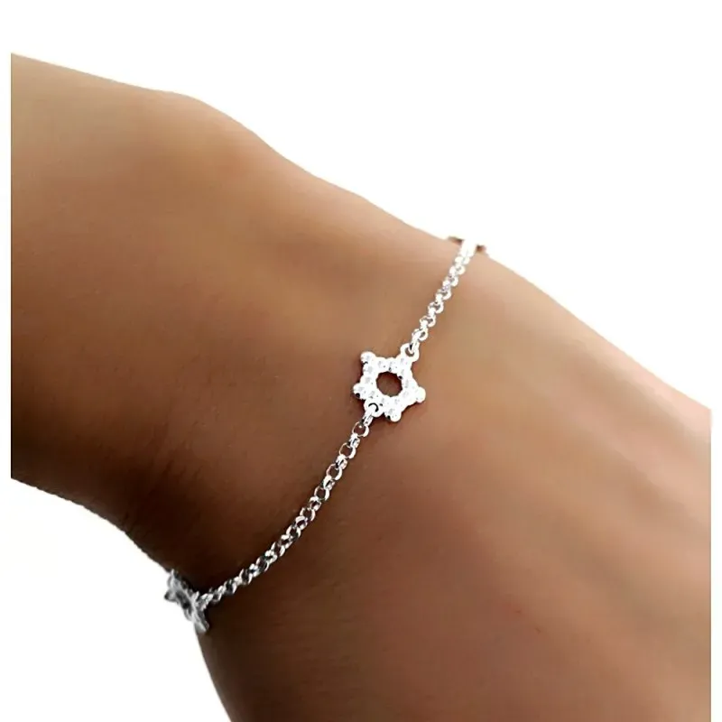 Pulsera plata Ley 925m. cadena rolo 17cm. niña motivos estrellas caladas cierre mosquetón