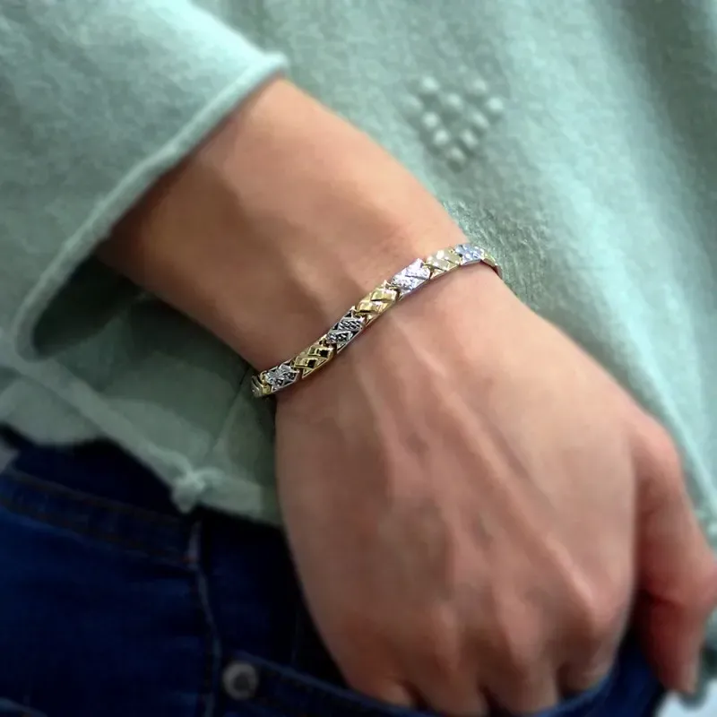 Pulsera oro bicolor 18k estampación semirrígida 19cm. eslabones rectángulos brillo cierre mosquetón