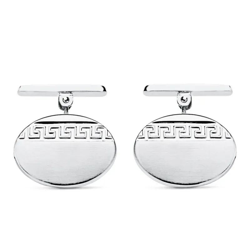 Gemelos oro blanco 18k ovales 18mm. motivo greca lisos
