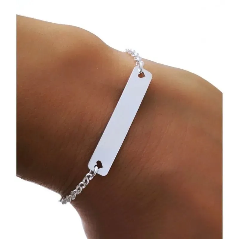 Pulsera esclava plata Ley 925m cadena rolo 19cm. chapa lisa 3.4x6mm. laterales corazones calados