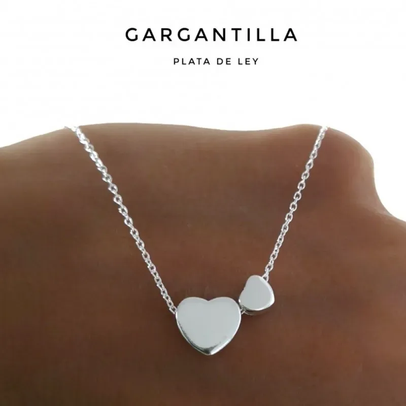 Gargantilla plata Ley 925m cadena 40cm. motivo corazones lisos distinto tamaño cierre reasa