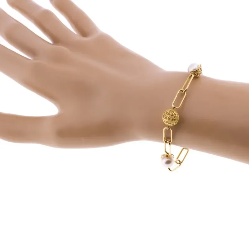 Pulsera oro 18k eslabones ovales rectangulares perlas 8mm. bolas caladas cierre mosquetón