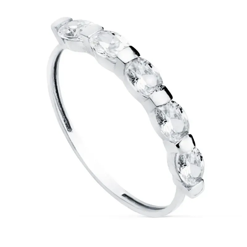 Sortija oro blanco 18k centro cinco circonitas ovales 4x3mm. alternas