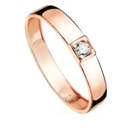 Sortija oro rosa 18k centro una circonita cuerpo 3.5mm. liso