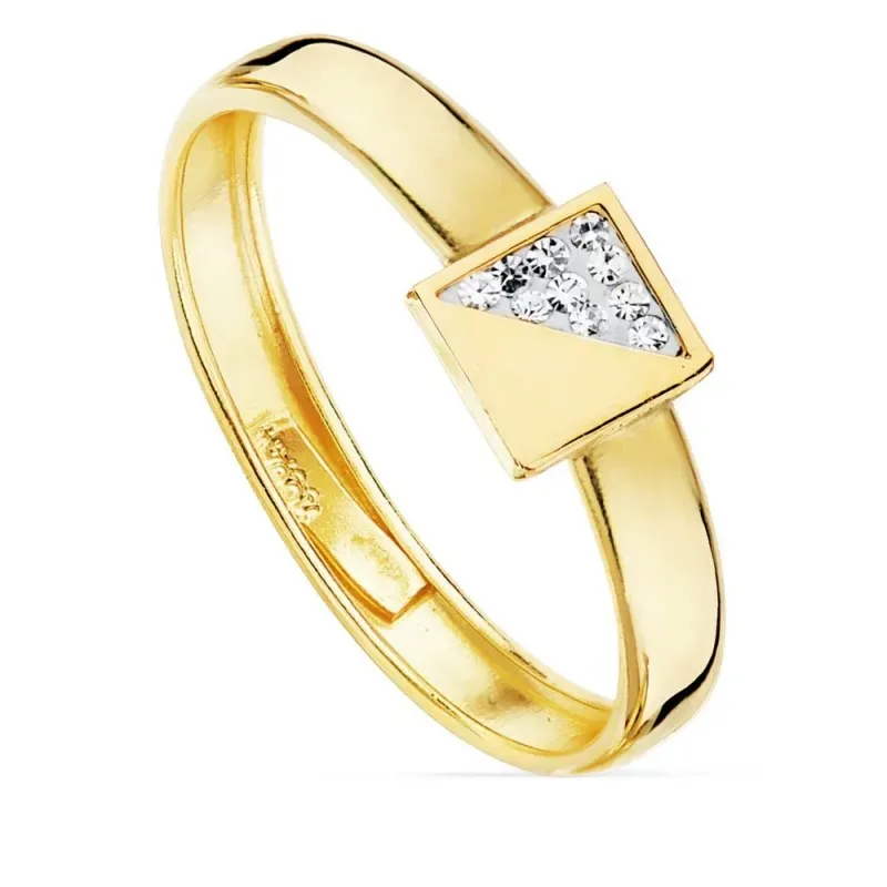 Sortija oro bicolor 18k centro forma cuadrado 5mm. mitad liso mitad circonitas cuerpo liso