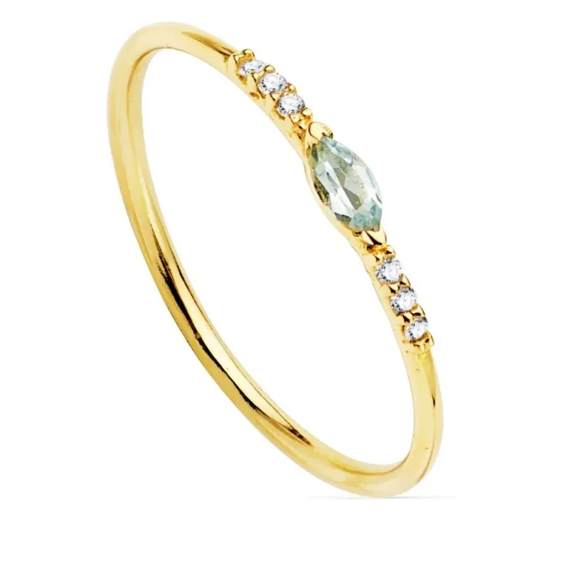 Sortija oro 18k laterales diamantes brillantes 0.03ct. centro piedra oval cuerpo liso