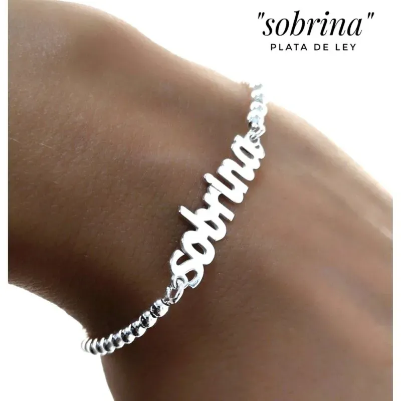 Pulsera plata Ley 925m 18cm. cadena bolas 3mm. detalle palabra SOBRINA 30mm. lisa cierre mosquetón