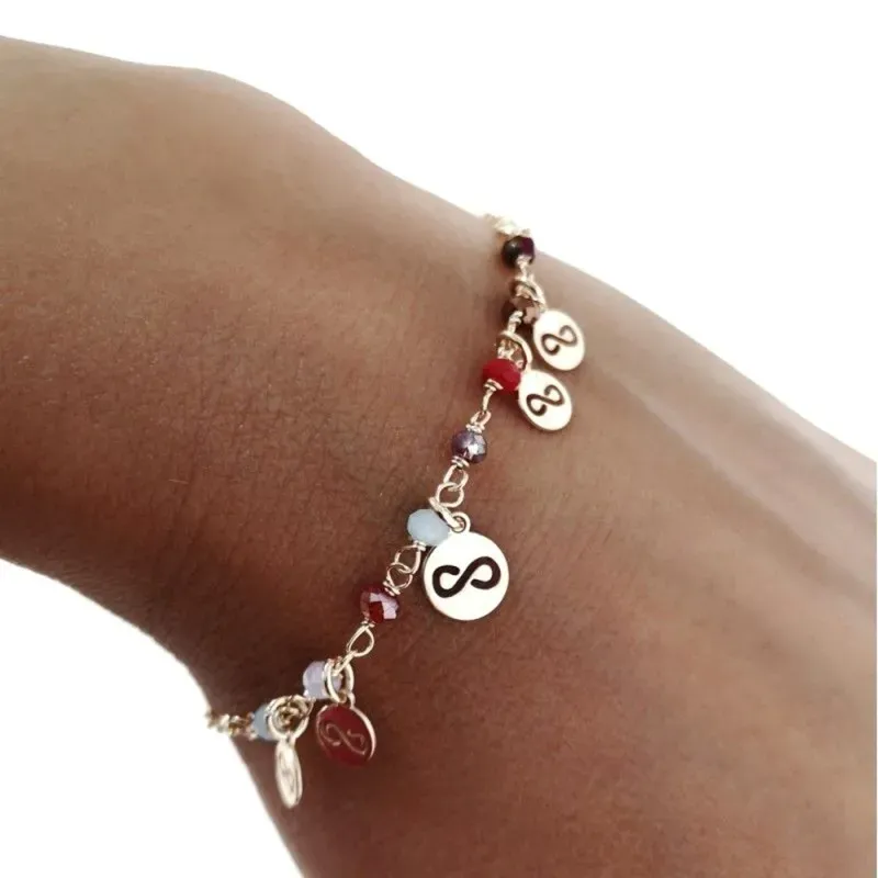 Pulsera plata Ley 925m chapada oro 17cm. piedras colores discos infinitos calados colgando