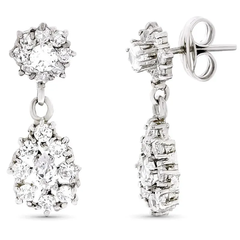 Pendientes oro blanco 18k largos 21mm. circonitas forma lágrima colga