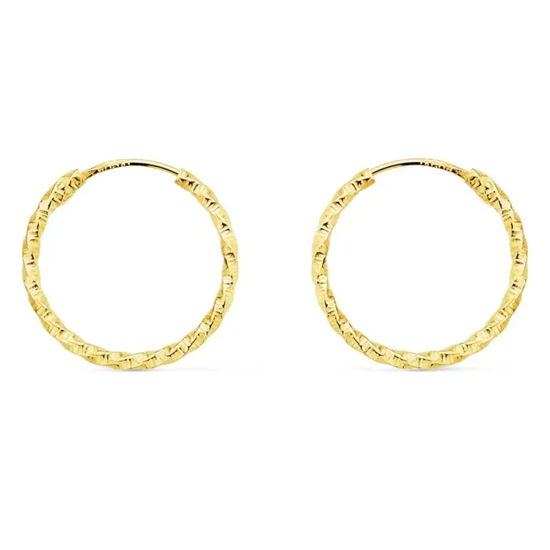 Pendientes oro 18k aros huecos 15mm. retorcidos tallados