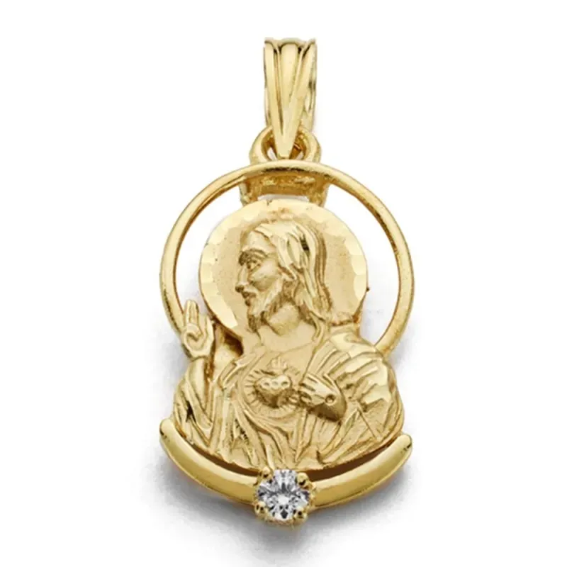 Colgante oro 18k silueta 21mm. Corazón de Jesús detalle circonita