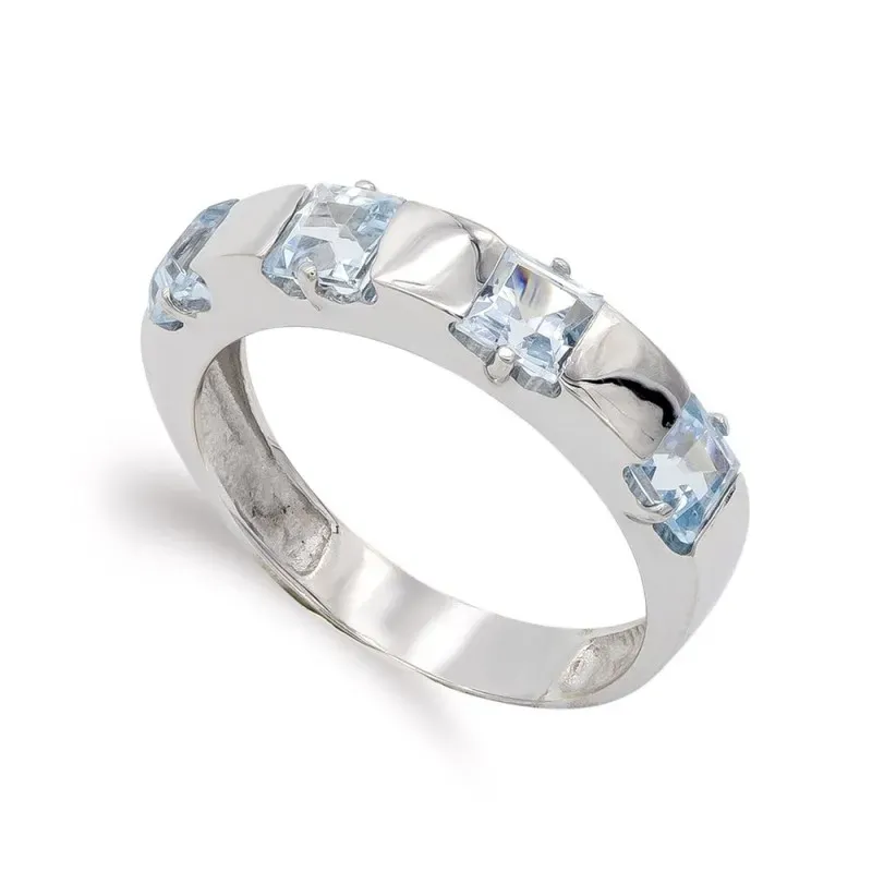 Sortija oro blanco 18k mujer piedra color azul claro combinada lisa