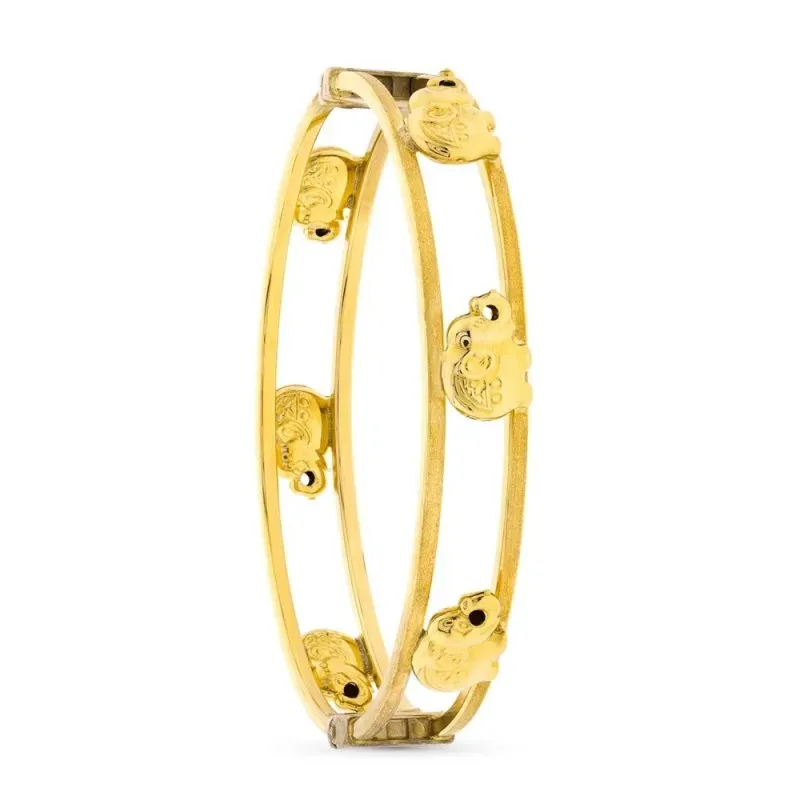 Pulsera oro 18k caña 11 mm. brazalete elefantes detalle