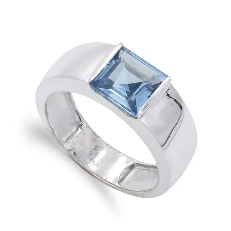 Sortija oro blanco 18k mujer aguamarina centro cabeza combinada centr