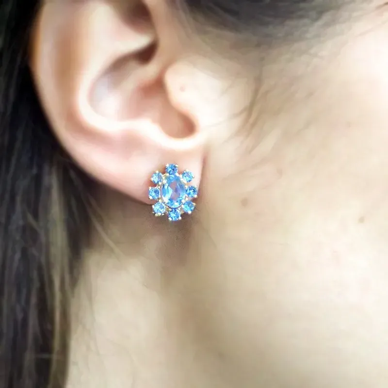 Pendientes oro 18k mujer aguamarina centro 7 mm. ovalada combinanada