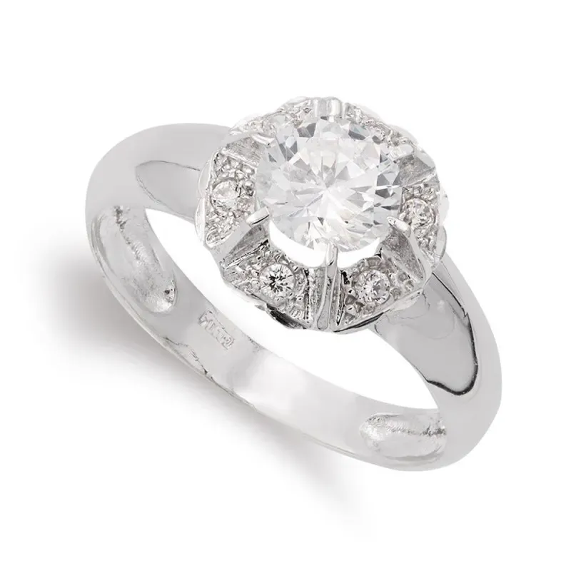 Sortija oro blanco 18k mujer circonitas garras cabeza redonda cuerpo