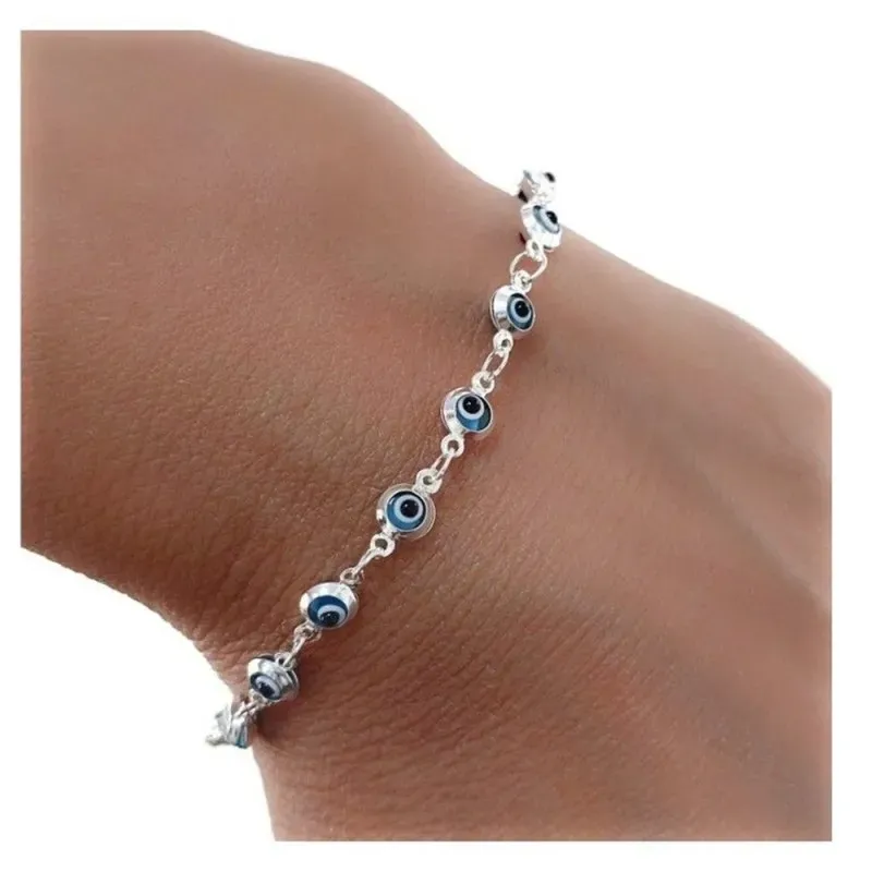 Pulsera plata Ley 925m mujer 18 cm. ojos turcos 5 mm. reasa