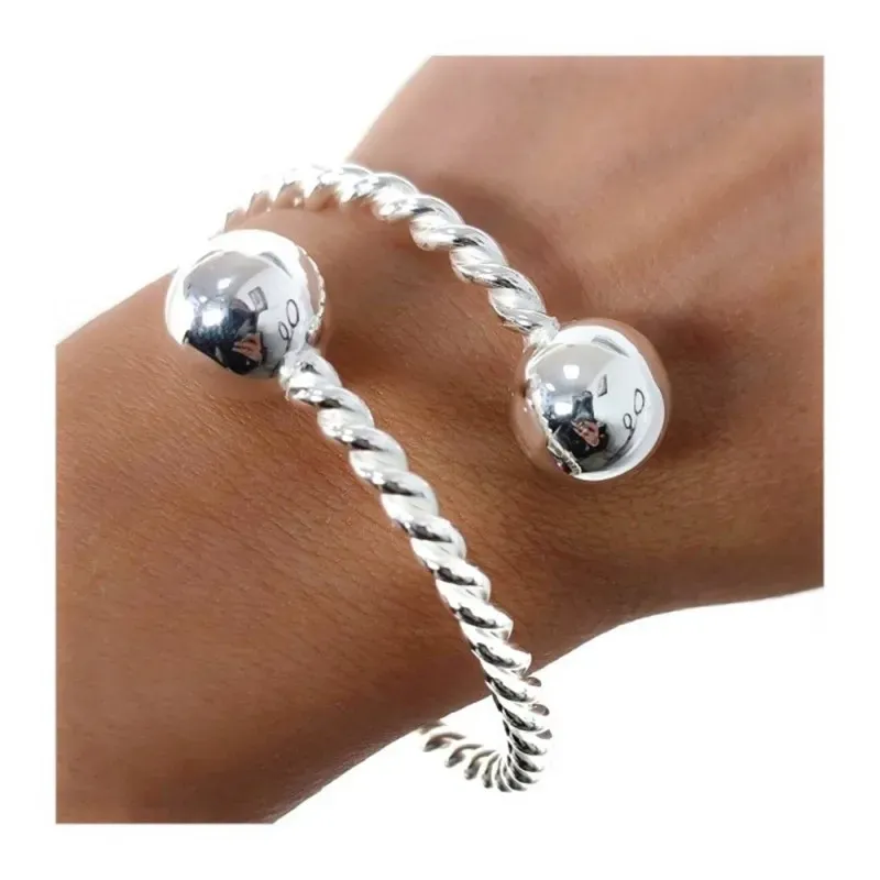 Pulsera Brazalete Plata Ley 925m tonisa 55 mm. bolas lisas 14 mm.