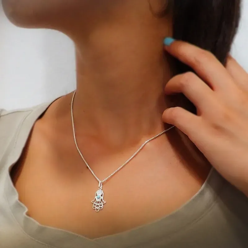 Colgante plata ley 925m 20mm. mano Fátima piedra color azul mujer
