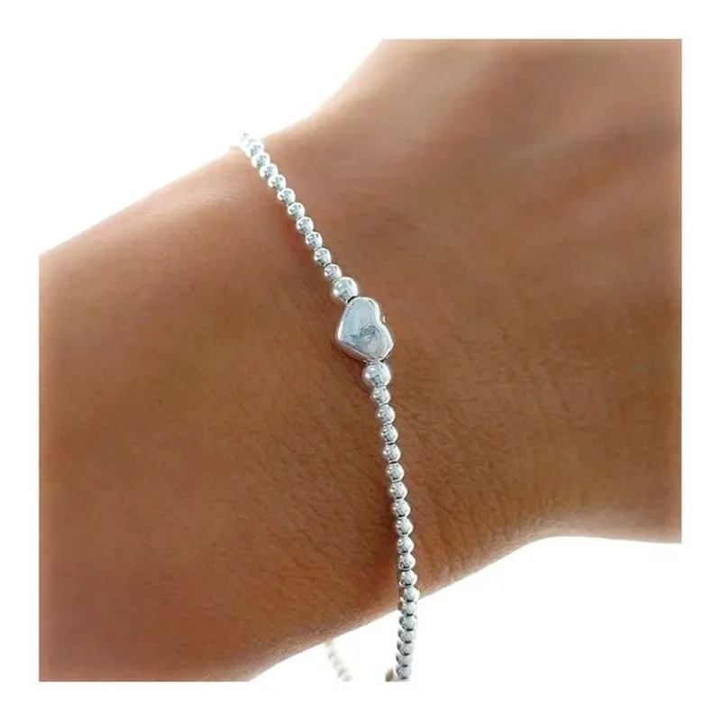 Pulsera Plata Ley 925m mujer elástica bolas lisas 2 mm. corazones 6 m