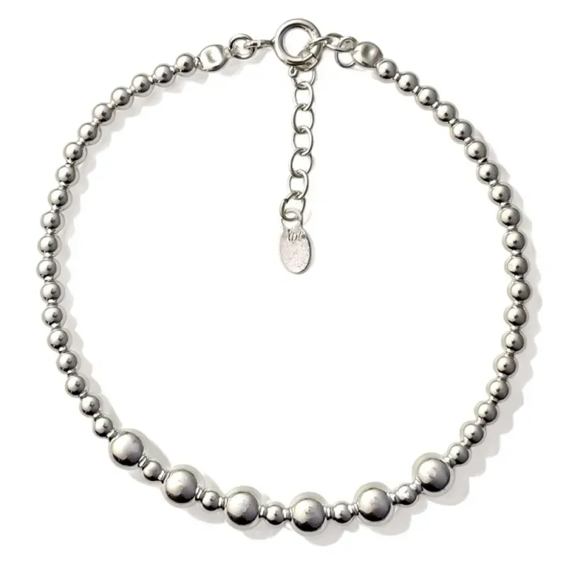 Pulsera en Plata de Ley 925m de 17 cm. con bolas lisas combinadas de