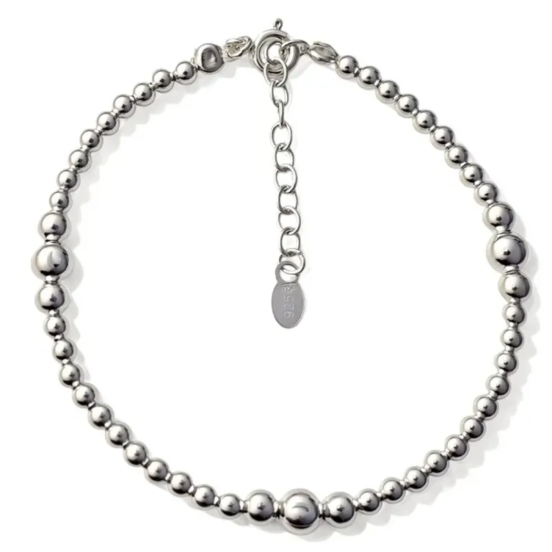 Pulsera en Plata de Ley 925m de 17 cm. con bolas lisas combinadas de