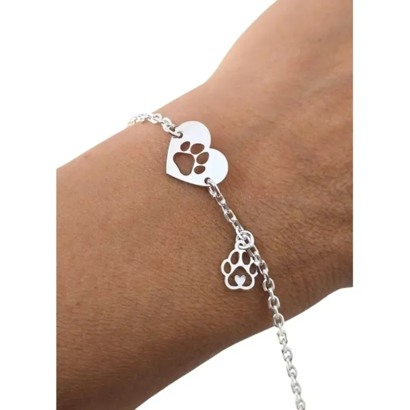 Pulsera en Plata de Ley 925m con 17 cm. corazón de 13 mm. huella perr