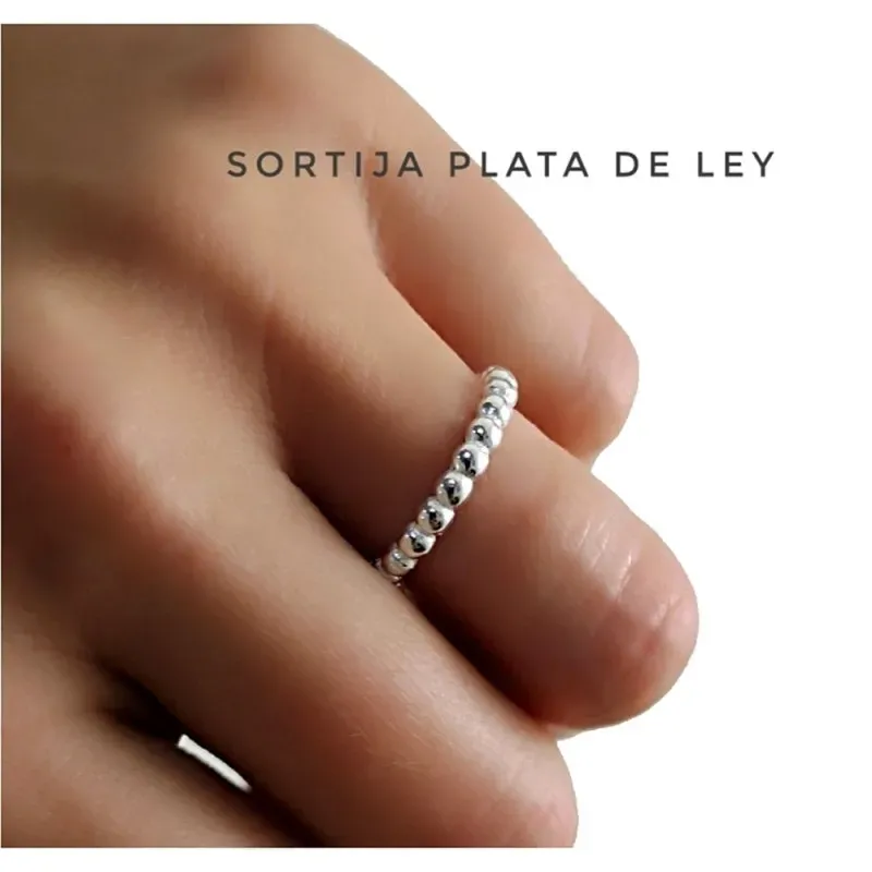 Sortija plata Ley 925m. mujer cuerpo bolitas continuadas