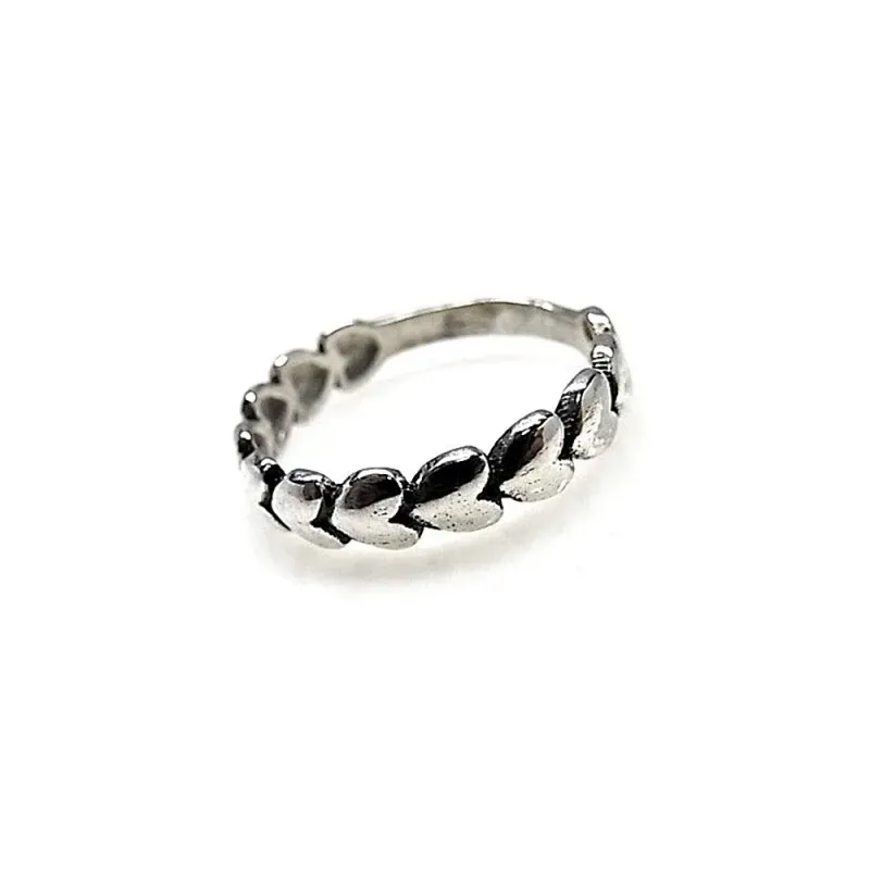 Sortija plata Ley 925m. mujer lisa cuerpo corazones oxidados continuados
