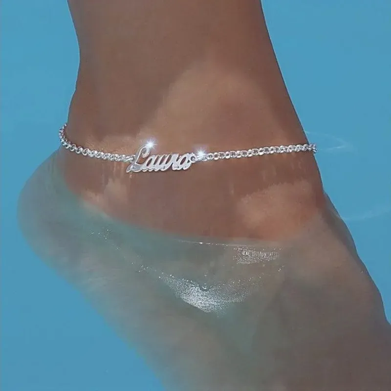 Tobillera plata Ley 925m cadena rolo 23cm. centro nombre liso personalizado cierre reasa