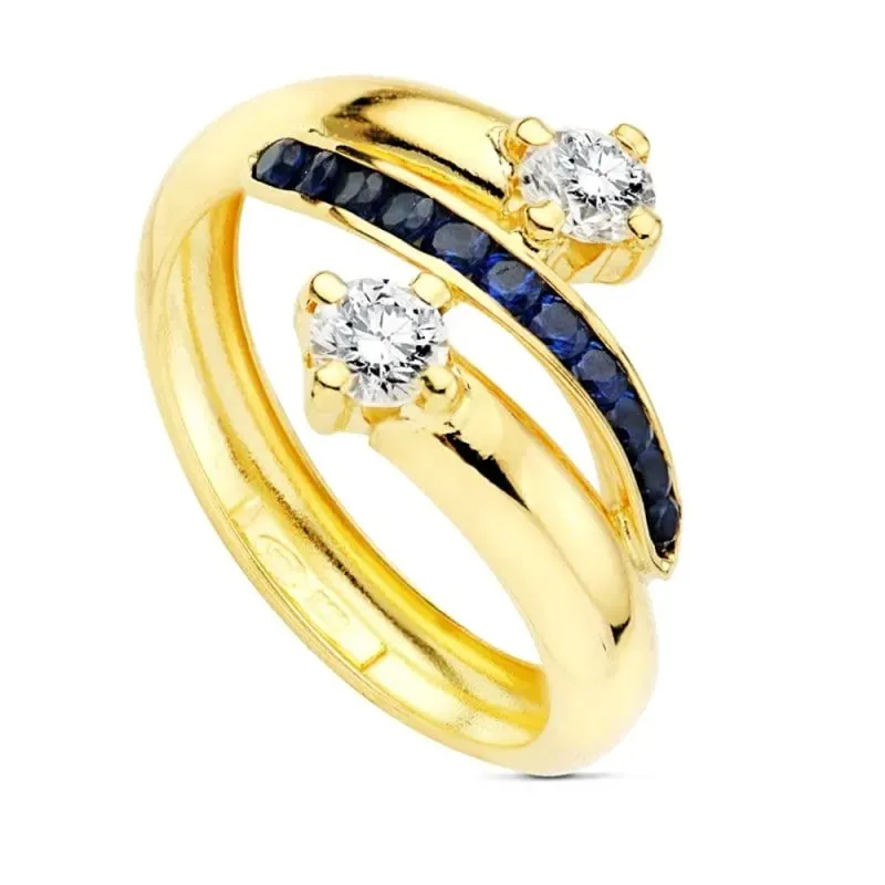 Sortija en Oro 9k con circonitas azules combinadas blancas dos bandas