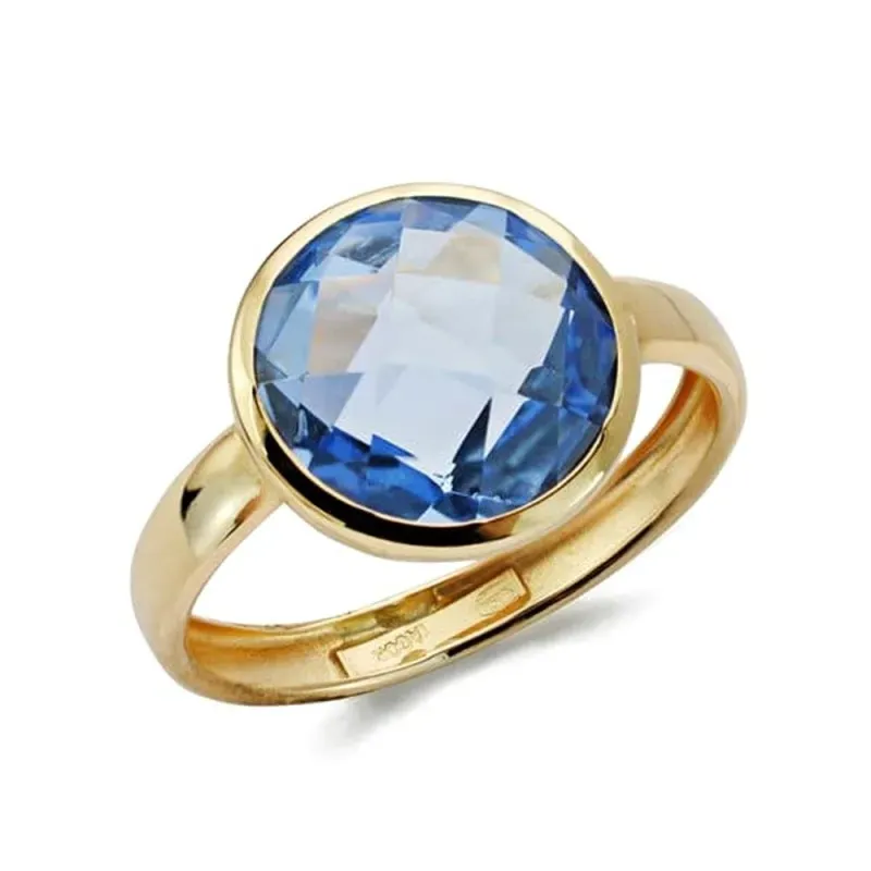 Sortija en Oro de 9k con circonita bocel color azul ancho de 12 mm.