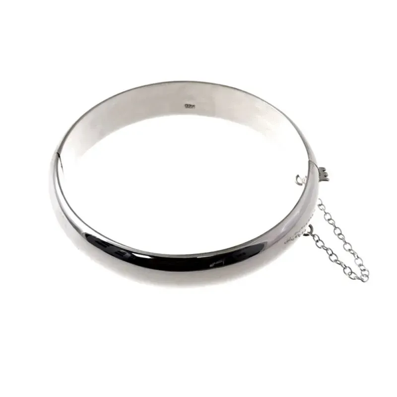 Pulsera brazalete plata Ley 925m media caña 60mm. lisa grueso 12mm. cadena de seguridad