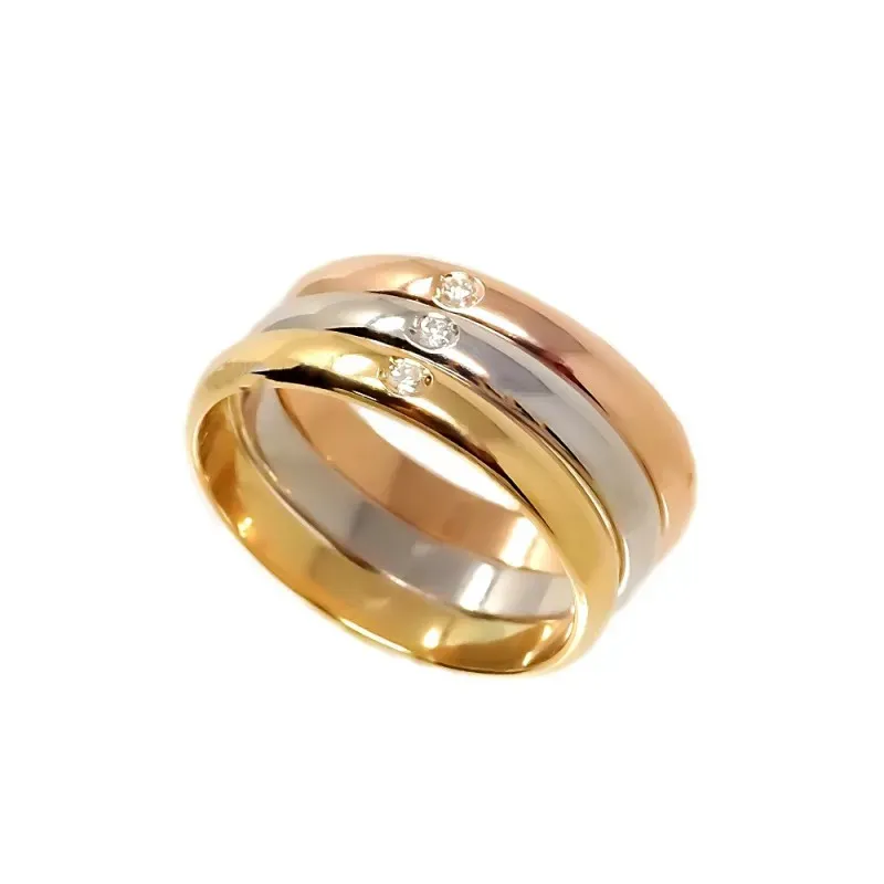 Alianza oro tricolor 18k tres brillantes 0.032ct. diámetro 2mm. Ancho
