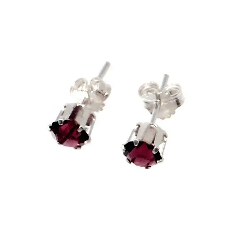 Pendientes plata Ley 925m circonita garras 6mm. color malva cierre presión