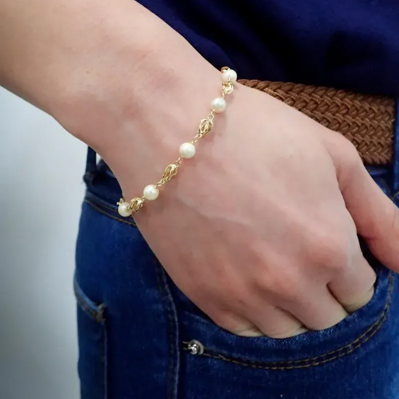 Pulsera Oro Amarillo 18k modelo Bracelets (9 Perlas Cultivadas 4,5-5mm.) Medida: 17cm.