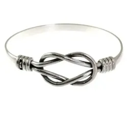Pulsera plata Ley 925m rígida 70mm. centro nudo marinero macizo unise